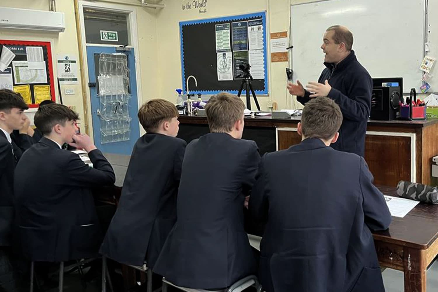 tom cardale with students